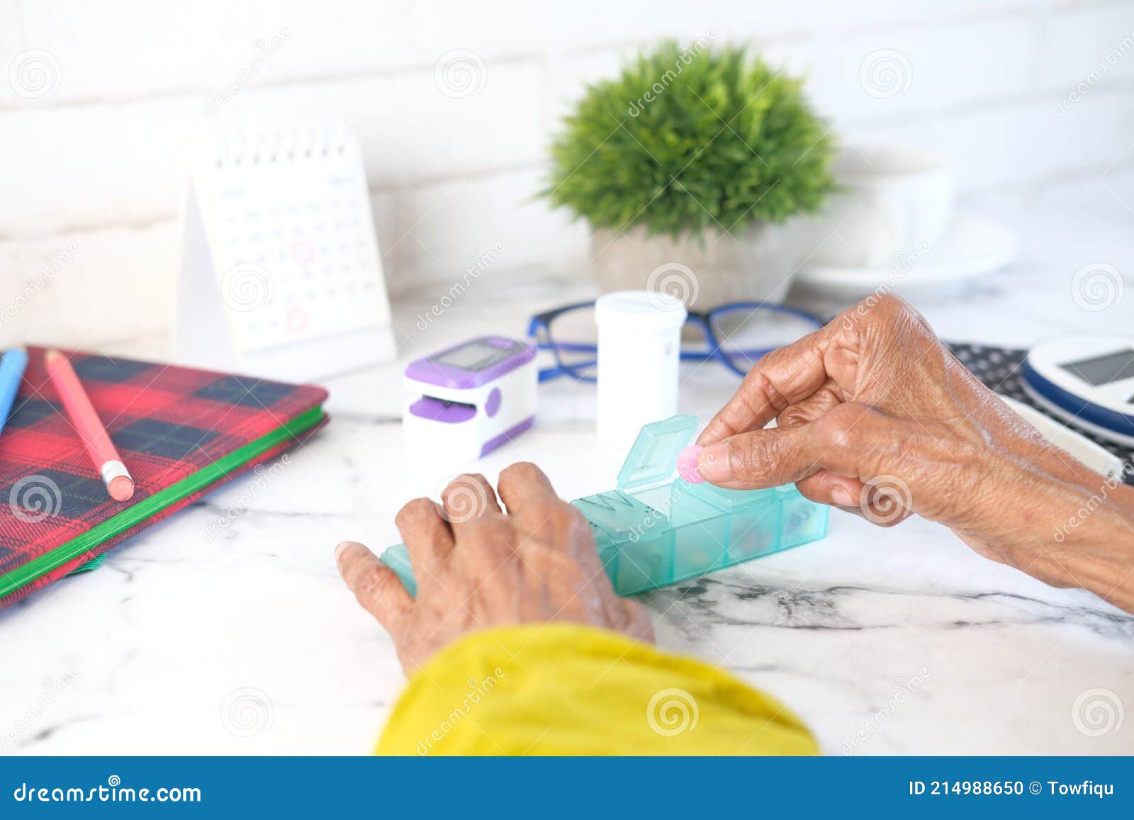 Elderly Women Taking Medicine from a Pill Box Stock Photo Image of week, senior 214988650