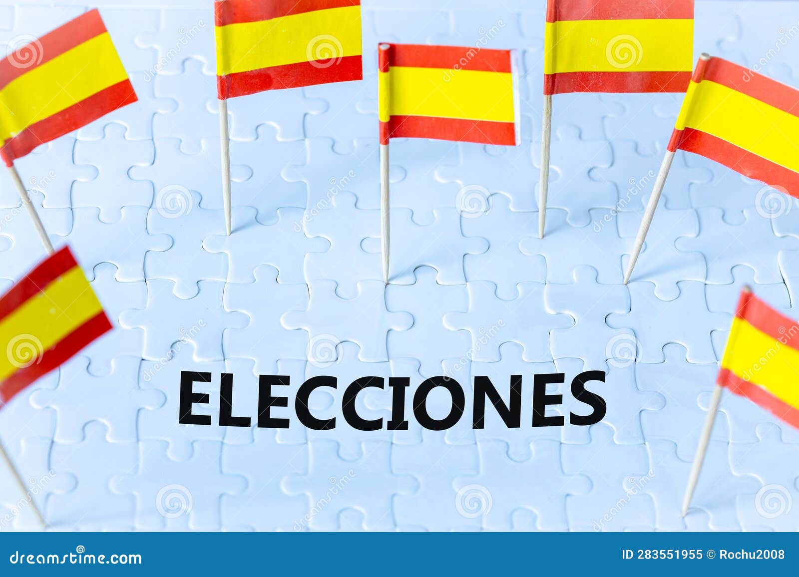elections in spain, the concept of the spanish flag and the text elecciones meaning vote in english on white puzzles