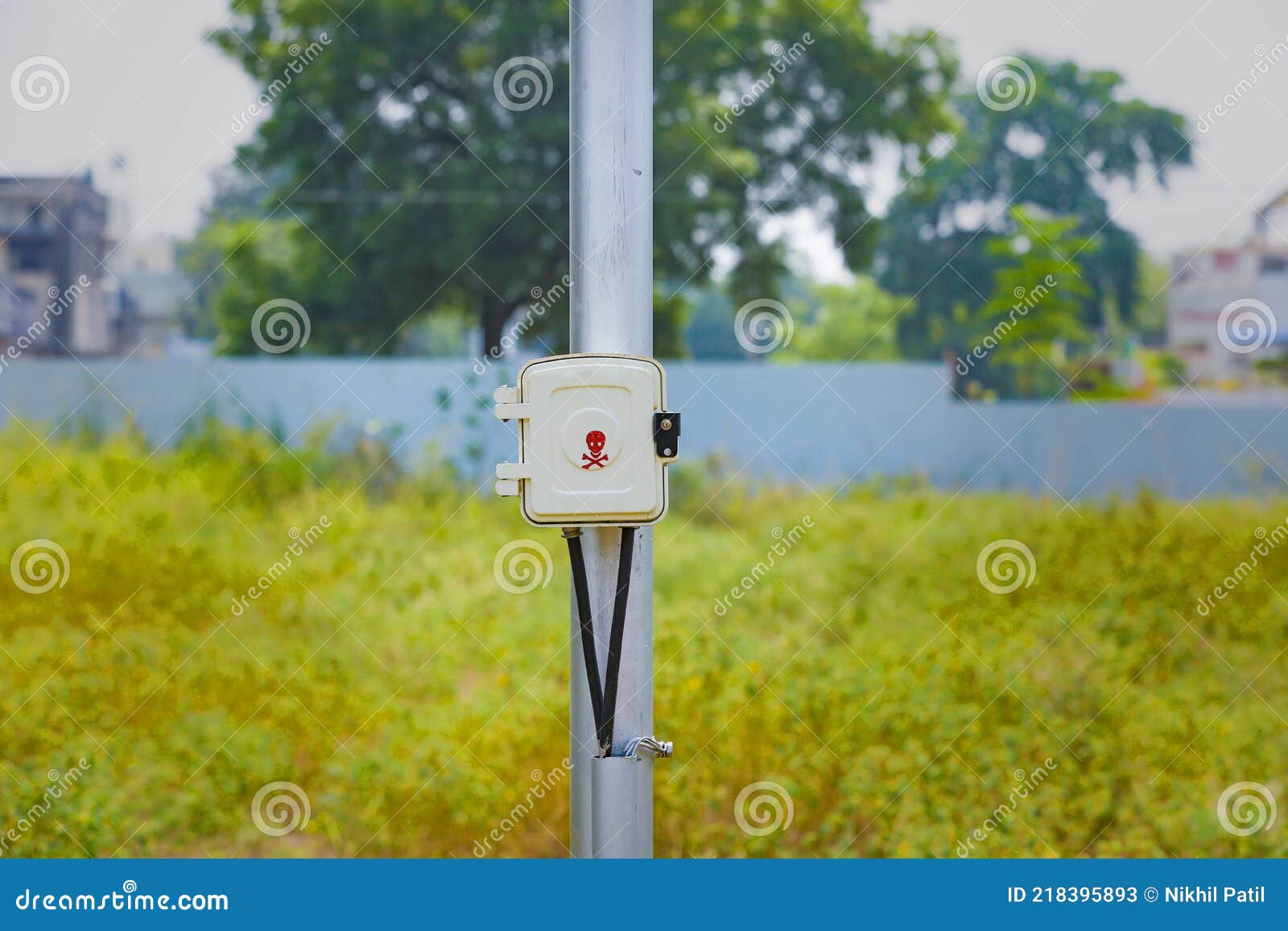 Electric Box with Danger Symbol on Street Electric Poll Stock Image