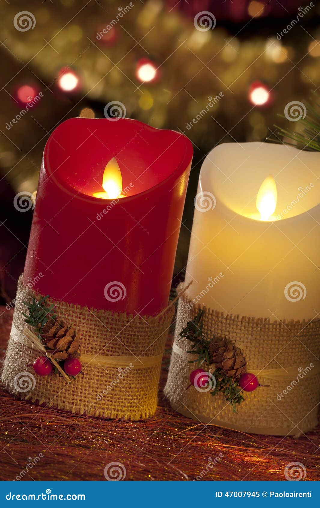 Electric Candles with Christmas Decorations in Atmospheric Light Stock