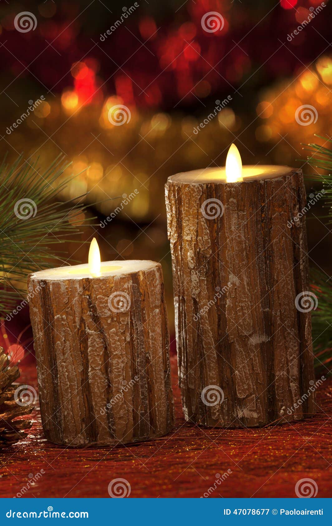 Electric Candles with Christmas Decorations in Atmospheric Light Stock