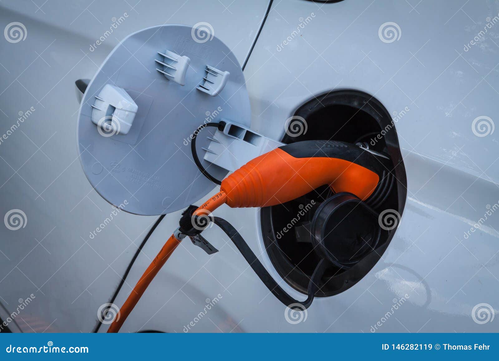 Electric car plug in editorial stock image. Image of economy 146282119
