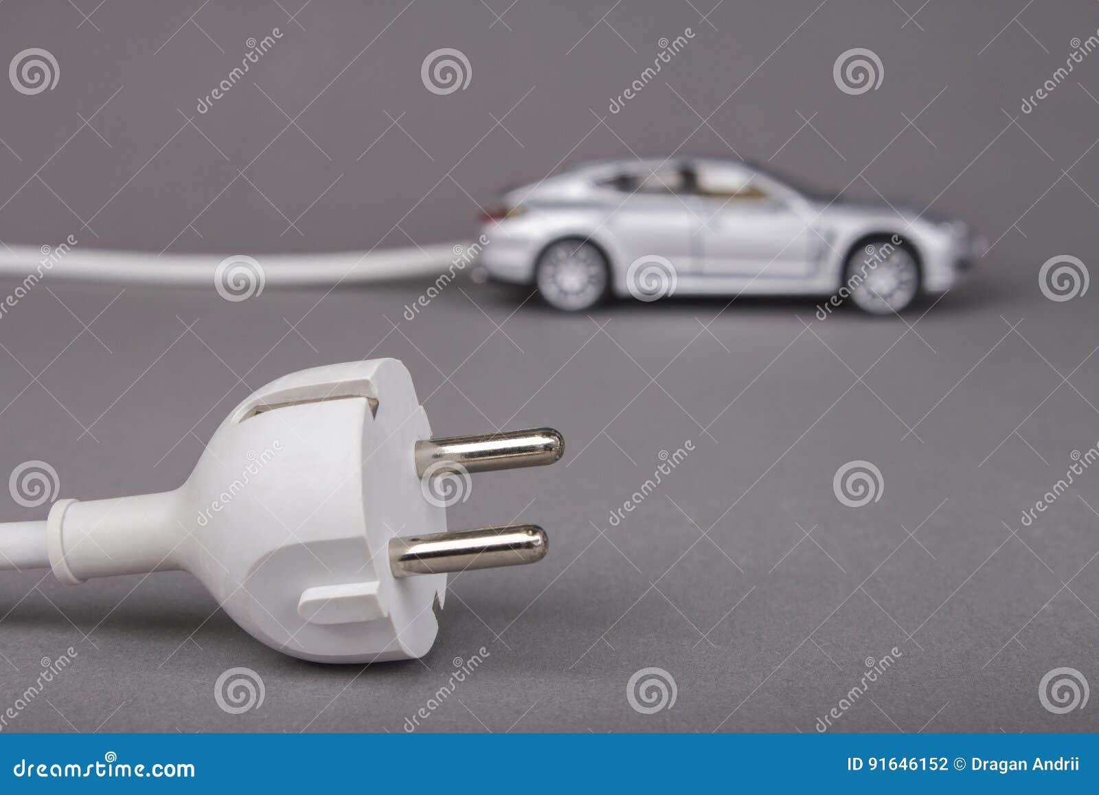 Electric Car with Plug from the Outlet. Stock Photo Image of motor