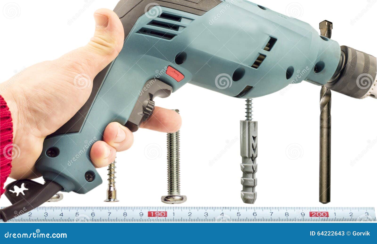 Electric Drill Hand Against Background Various Bolts Stock Photos