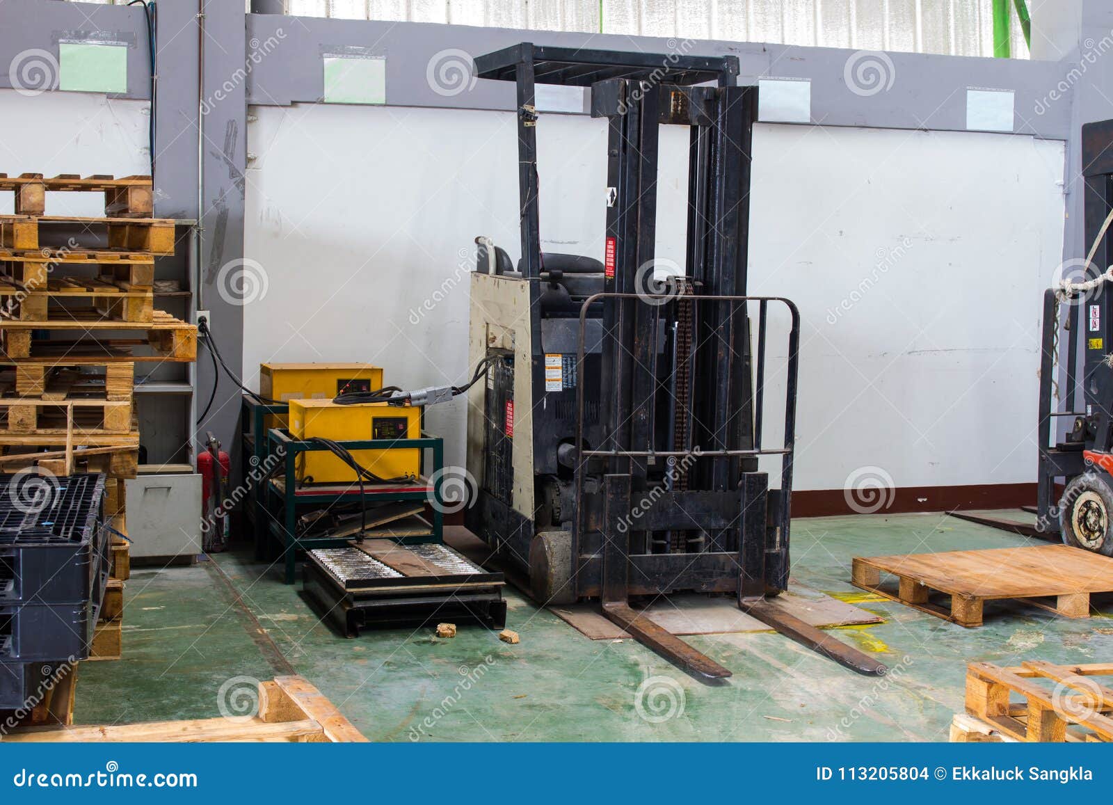 The Electric Forklift Charge the Battery. Stock Photo Image of