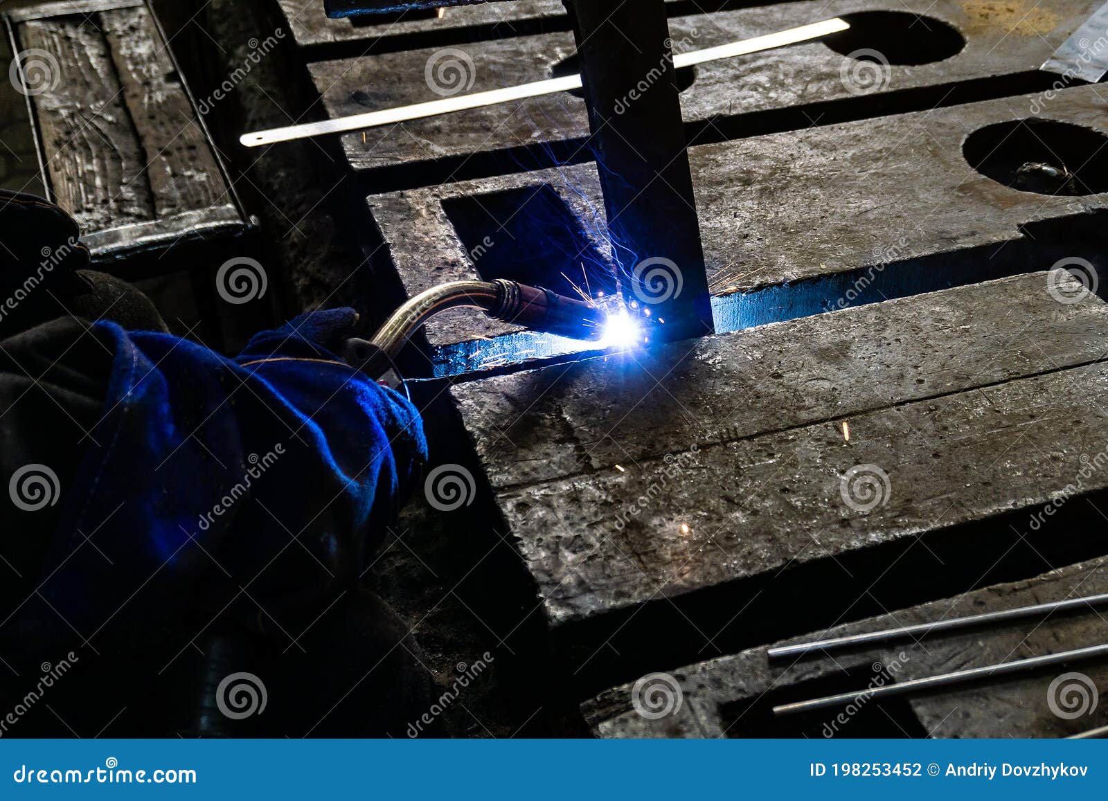 Electric Gas Welding in the Sparks from Welding Stock Photo