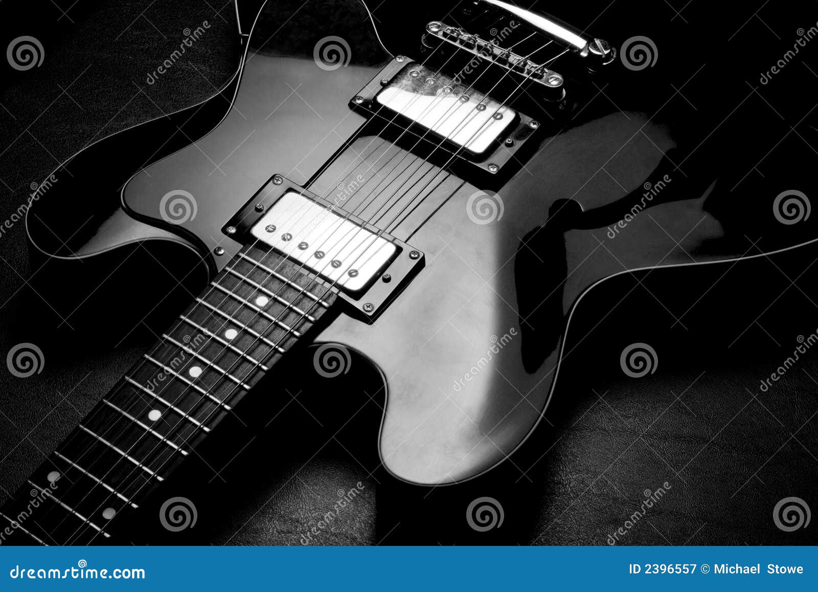 Electric Guitar on back bw stock image. Image of electric 2396557