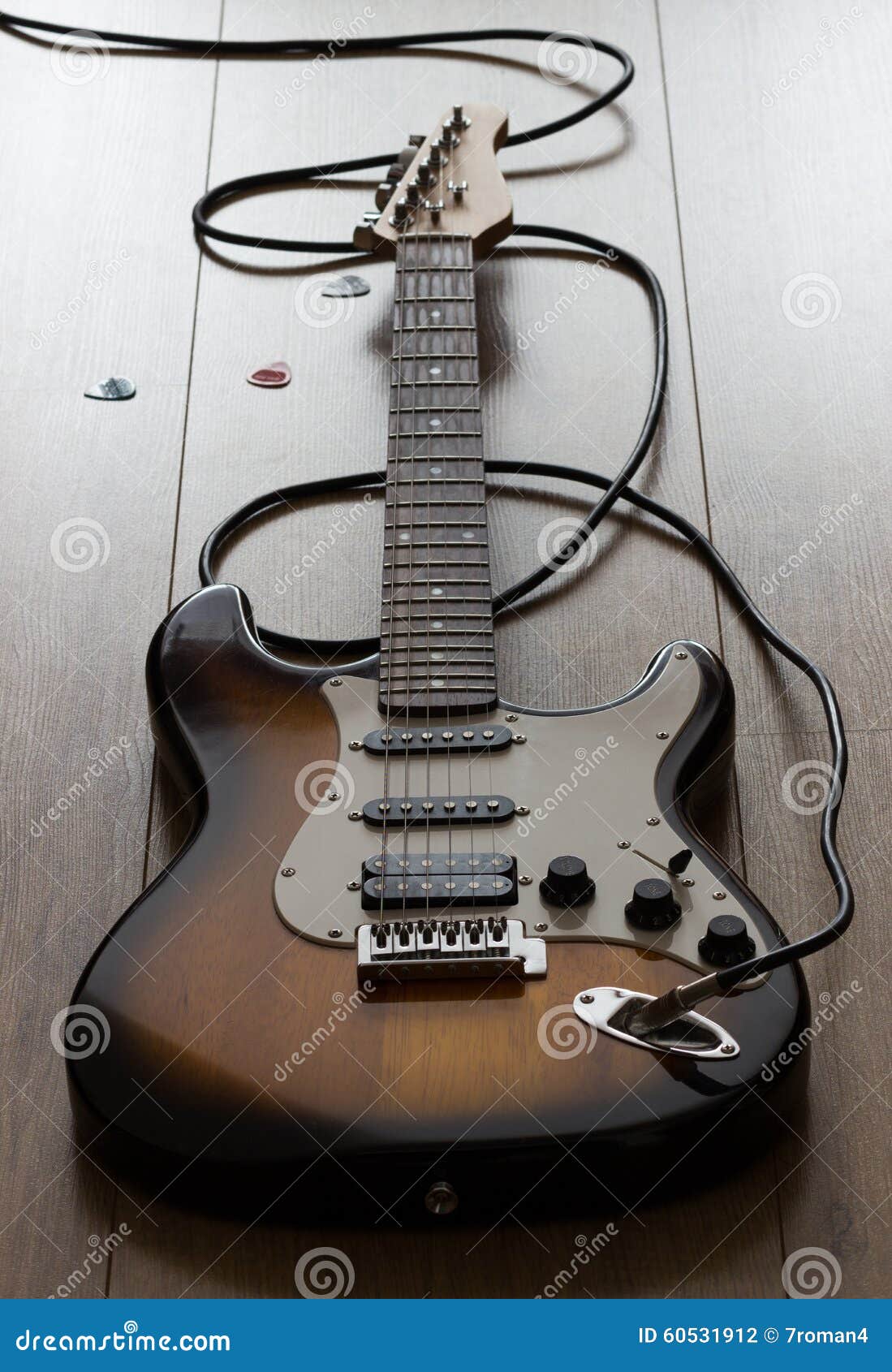 Electric Guitar with Cable, Plectrum. Stock Photo Image of ground