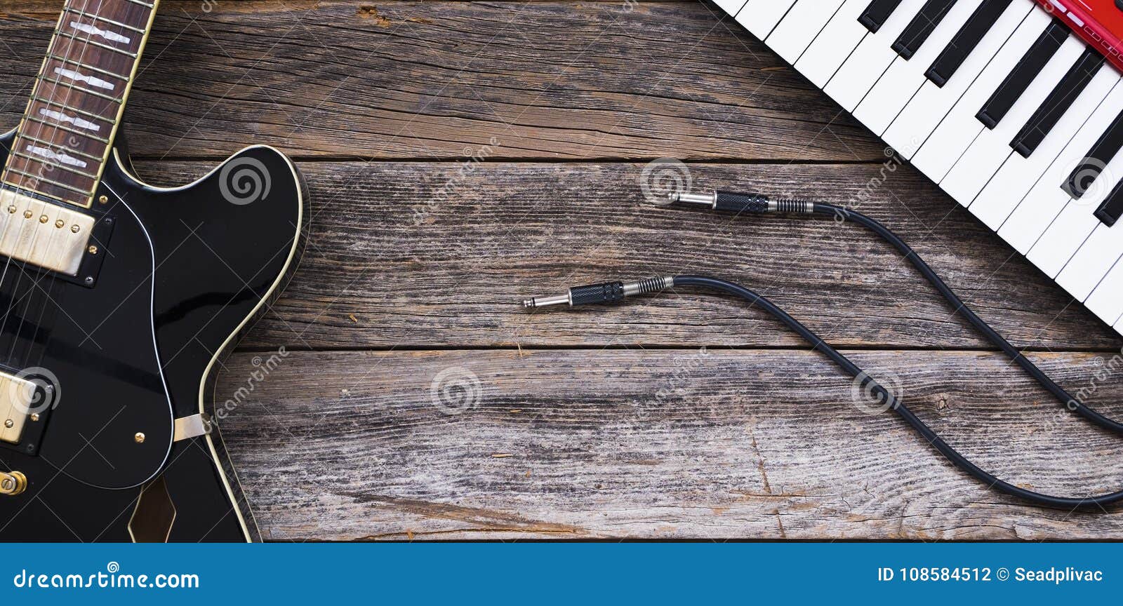 Electric Guitar, Keyboards and Guitar Cables Stock Photo Image of