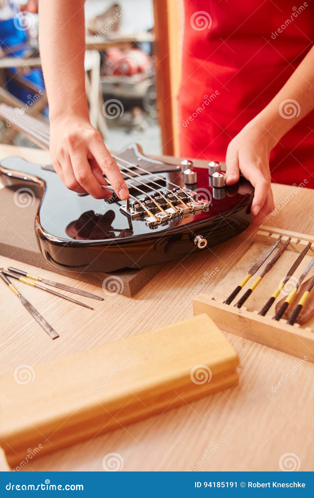 Electric guitar reparation stock image. Image of luthier 94185191