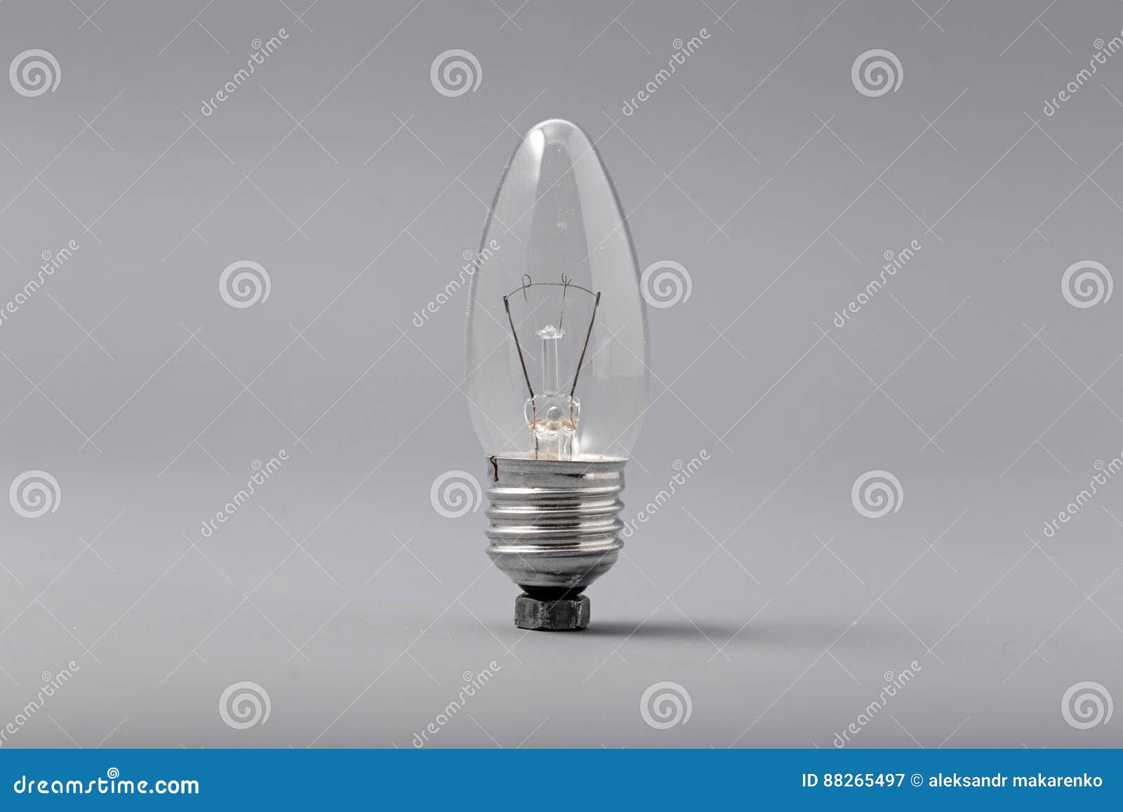 Electric Light Bulb on a Gray Background Stock Image Image of energy