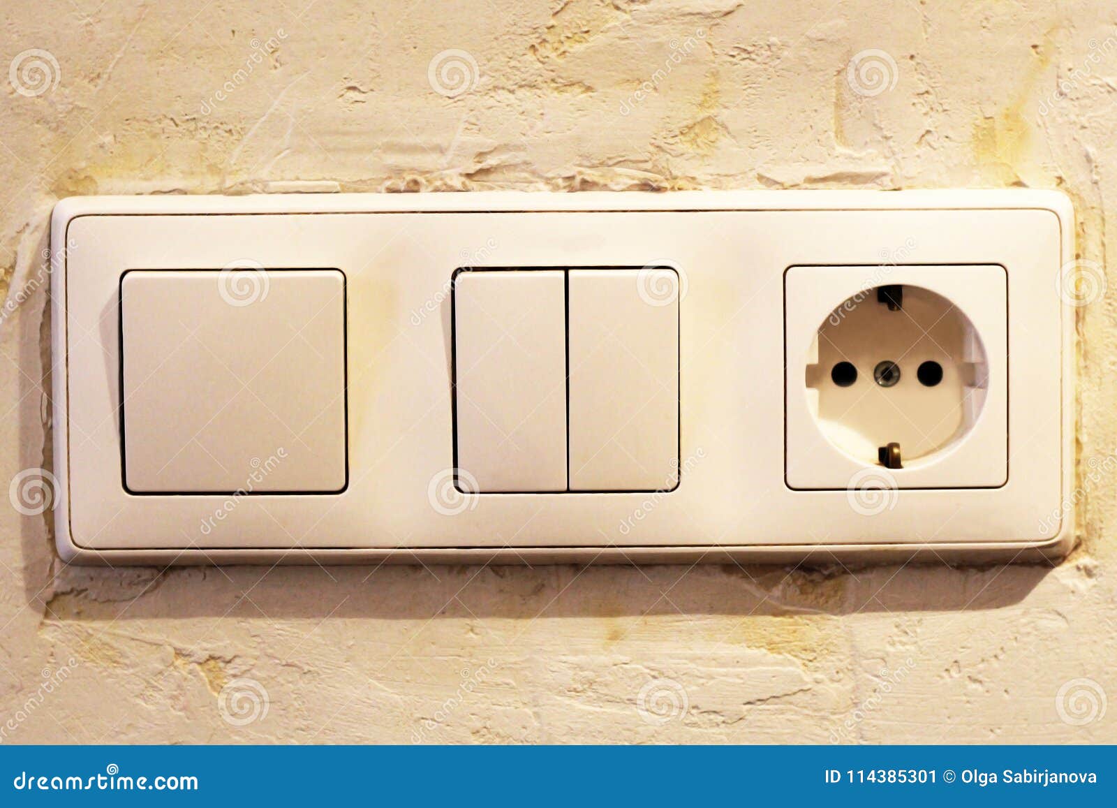 Electric Light Switch and Socket on the Empty Wall, Electrical Power