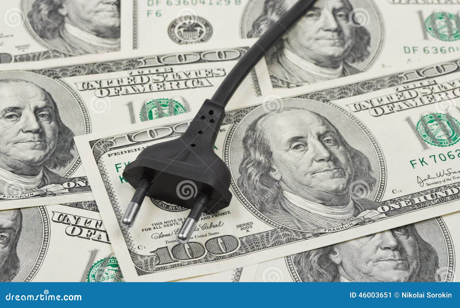 Electric plug on money stock image. Image of electric 46003651