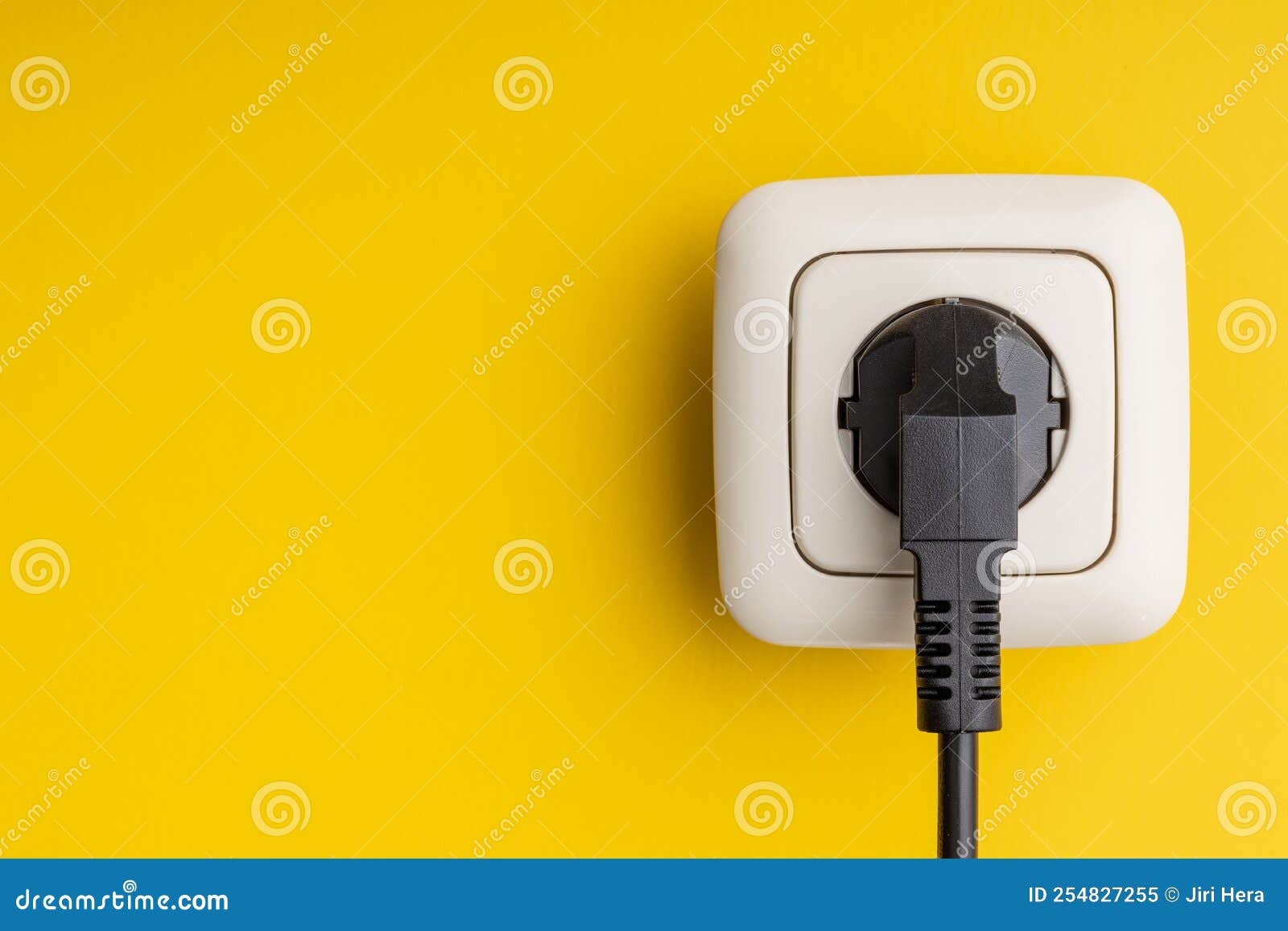 Electric Plug and Wall Socket on Yellow Wall Stock Image Image of