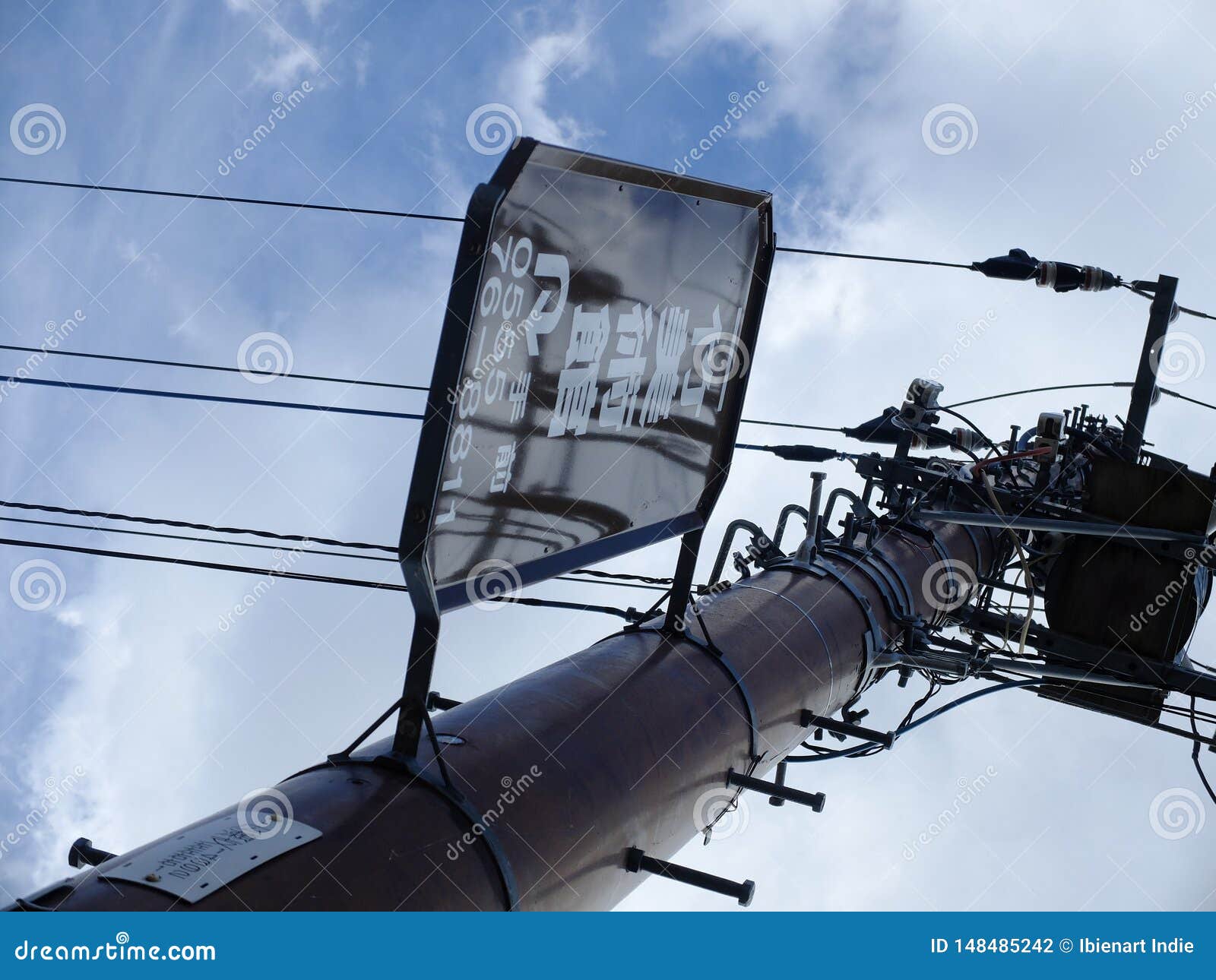 Electric poles in Japan stock photo. Image of clouds 148485242
