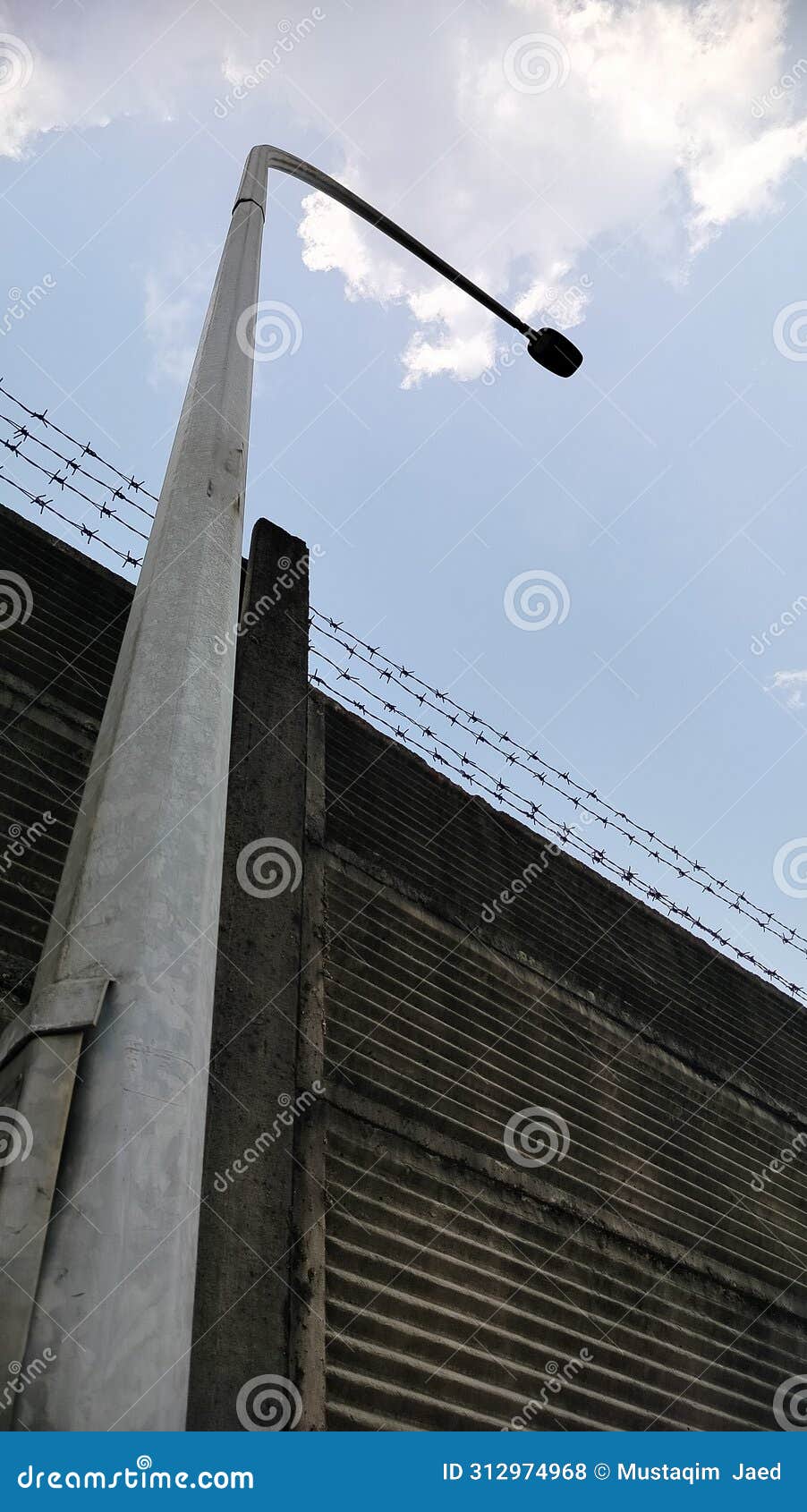 electric poles towered over the walls