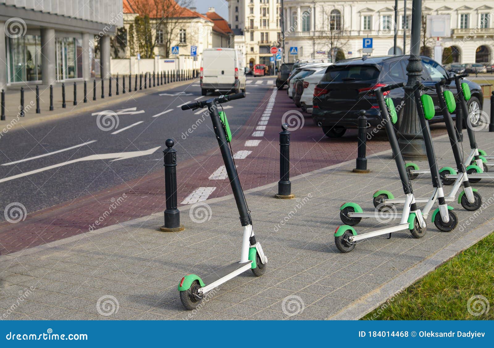 electric scooter parked on the road. modern eco electric city scooters for rent outdoors on the sidewalk. alternative transporte.