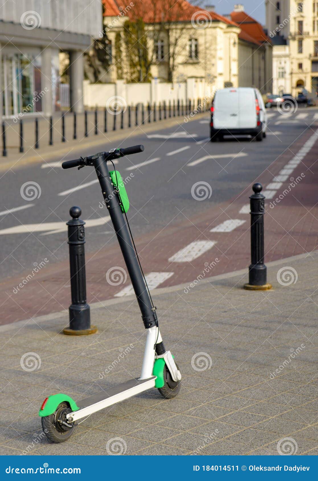 electric scooter parked on the road. modern eco electric city scooters for rent outdoors on the sidewalk. alternative transporte.