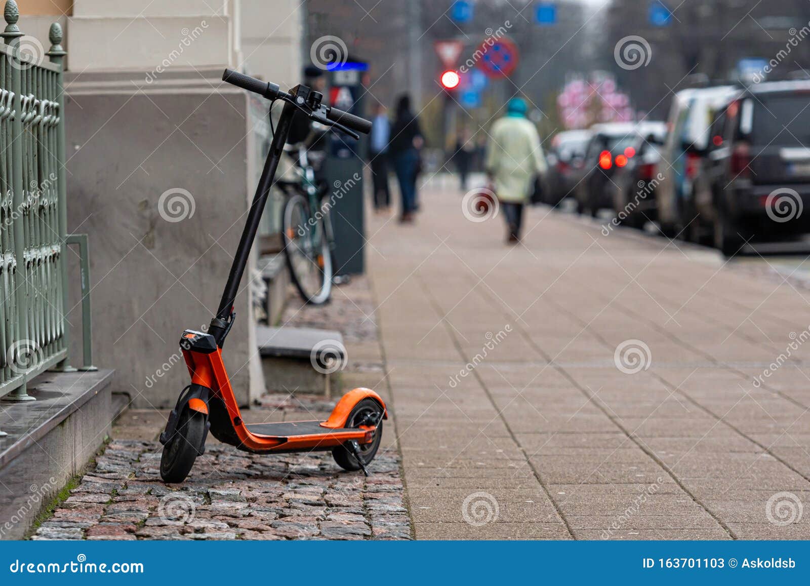 An Electric Scooter Parked on the Sidewalk in Riga, Latvia Stock Image Image of equipment