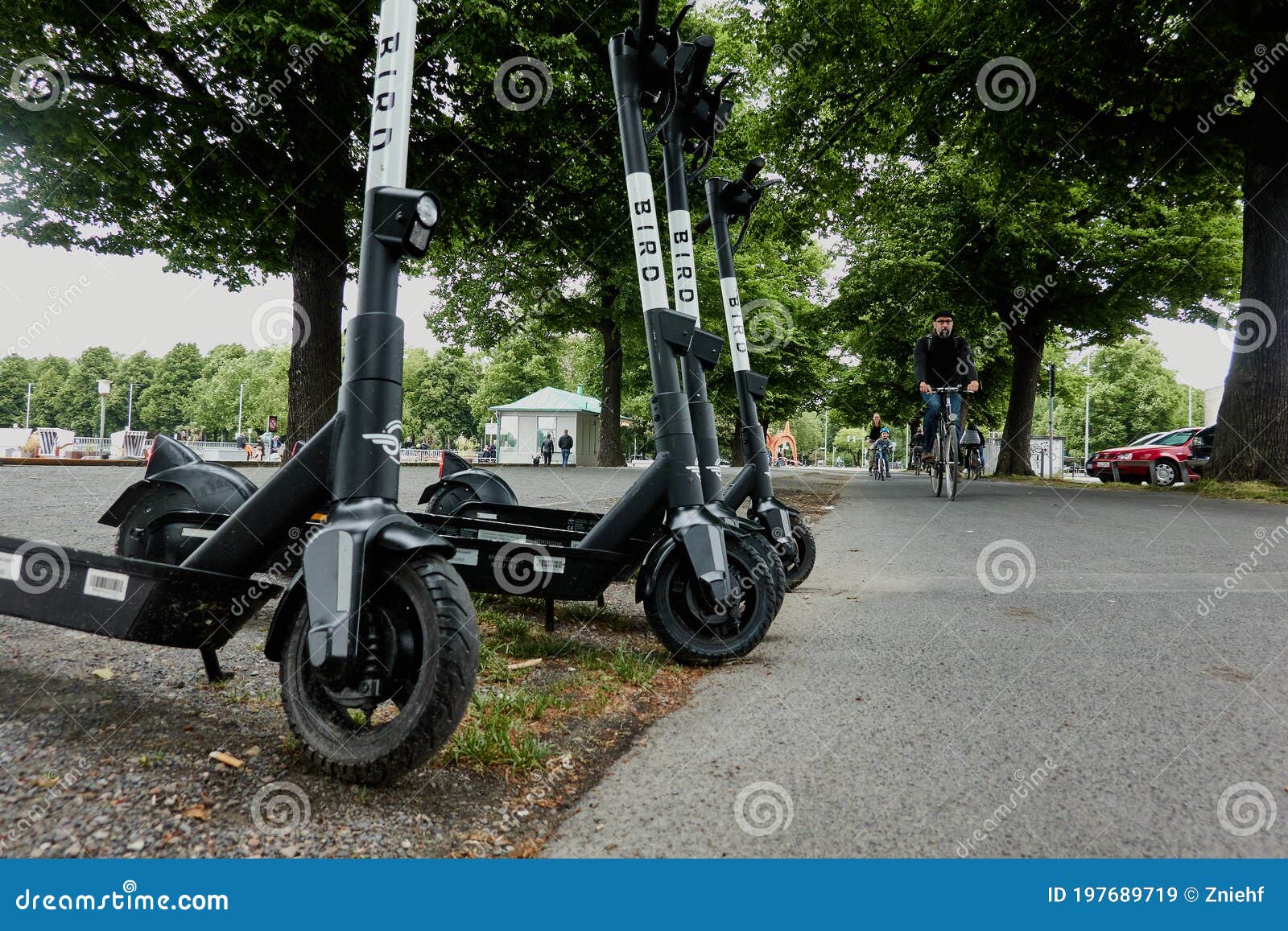Electric Scotters for Hire are Located Next To a Cycle Path Editorial