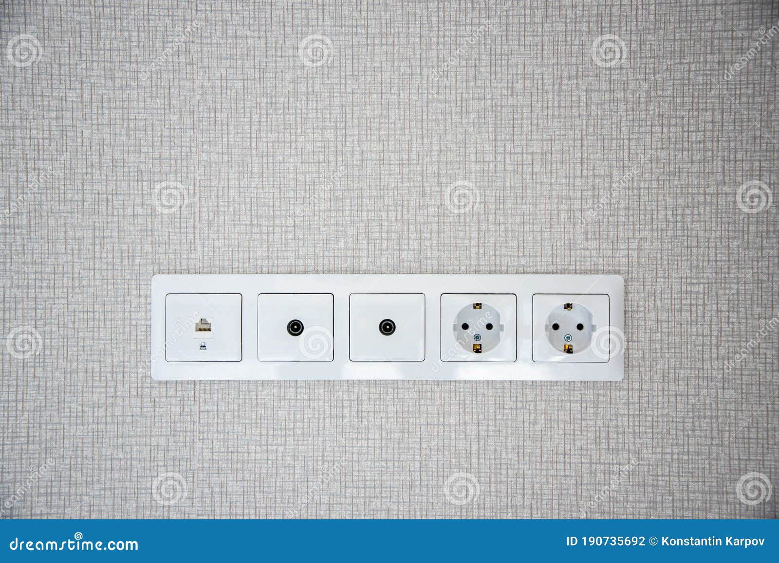 Electric Sockets on Light Wallpaper As a Background. Home Decroration