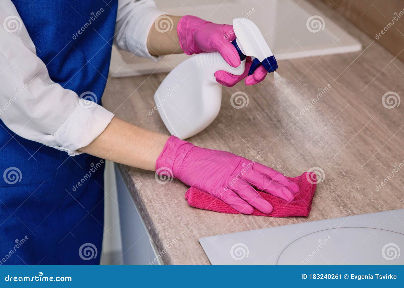 Electric Stove Cleaning on a Light White Kitchen Stock Image Image of