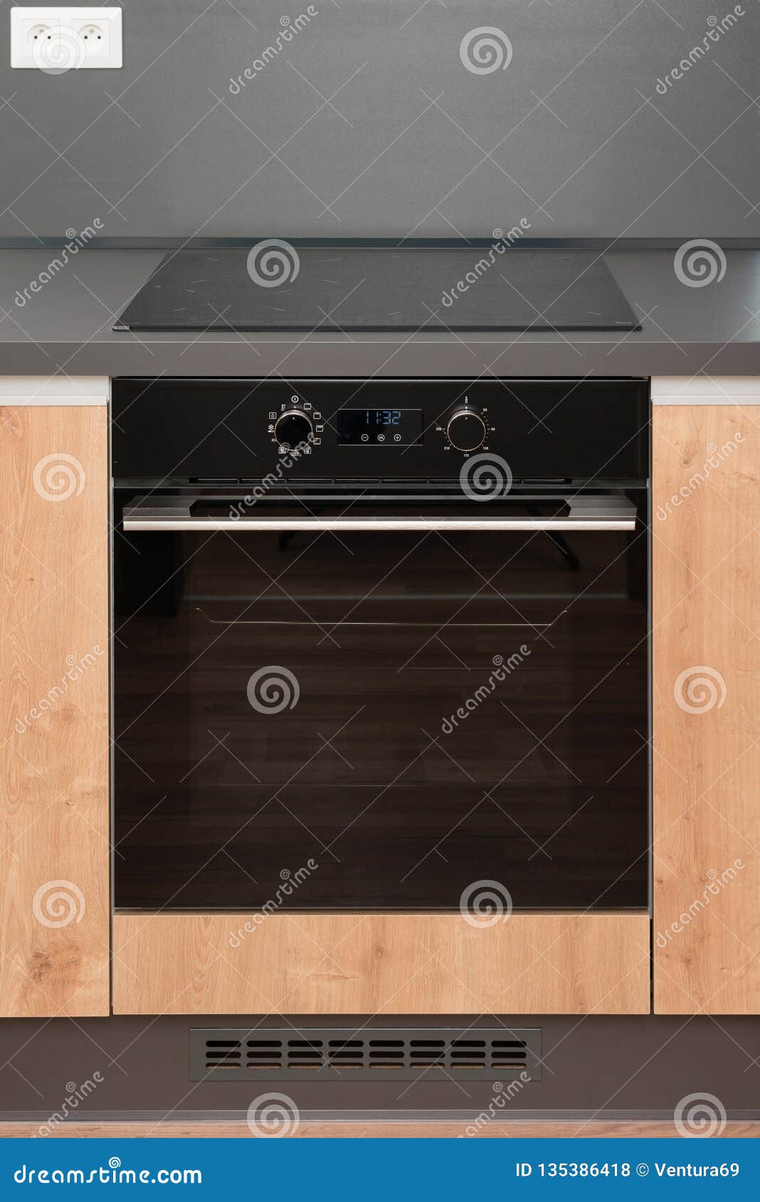 Modern Electric Stove With Induction Cooktop In The Kitchen Stock Photo,  Picture and Royalty Free Image. Image 81263807.