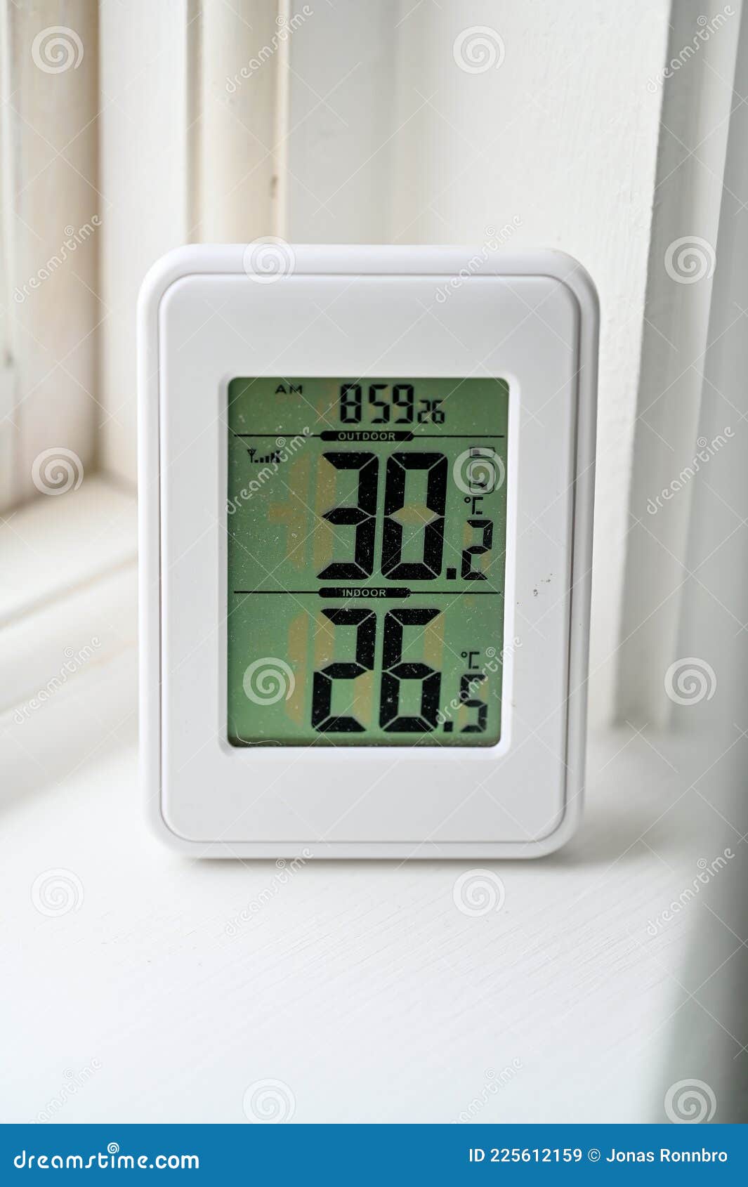 electric thermometer shows the degrees in celcius