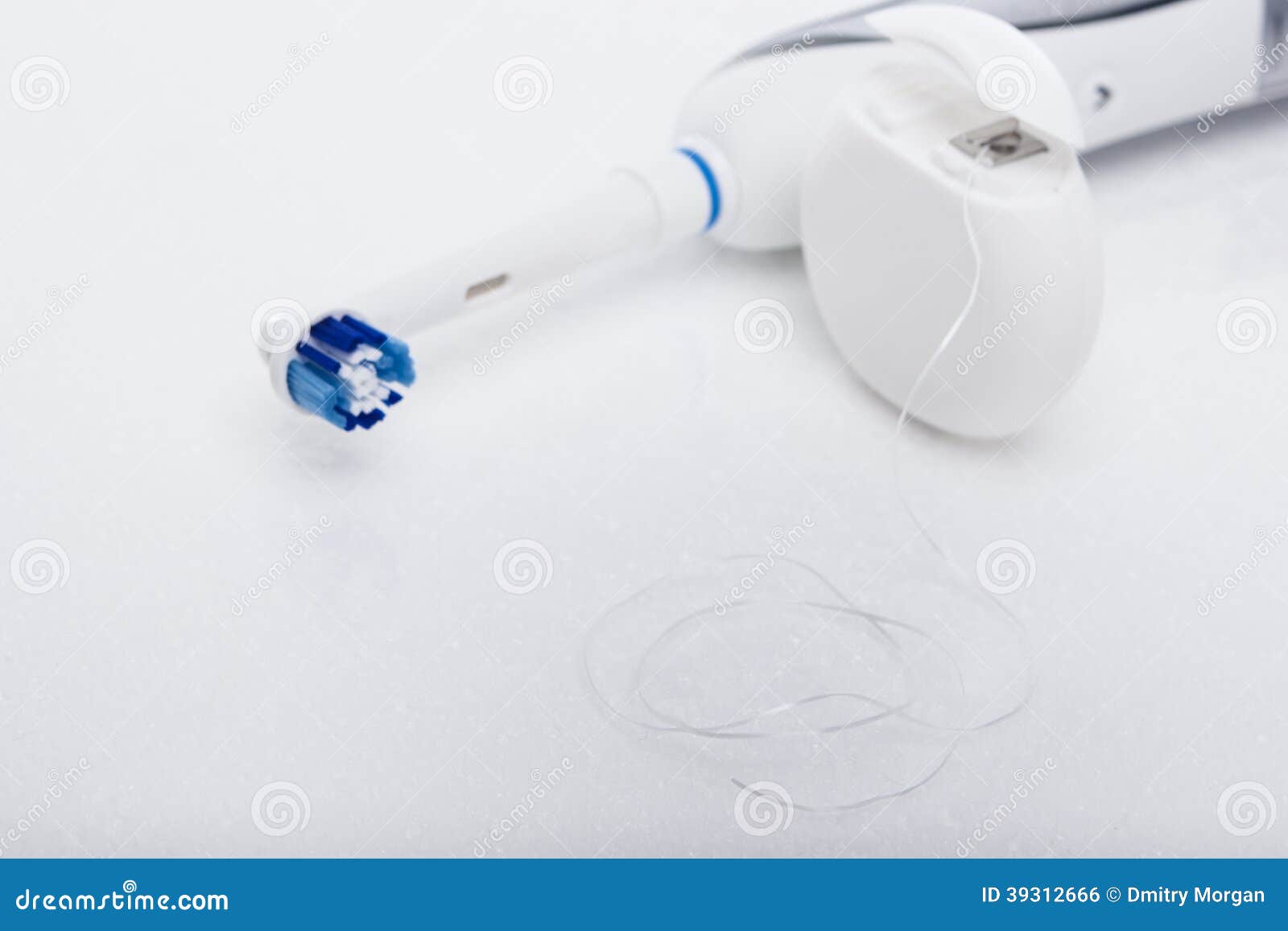 Electric Toothbrush and Dental Floss on White Stock Photo Image of