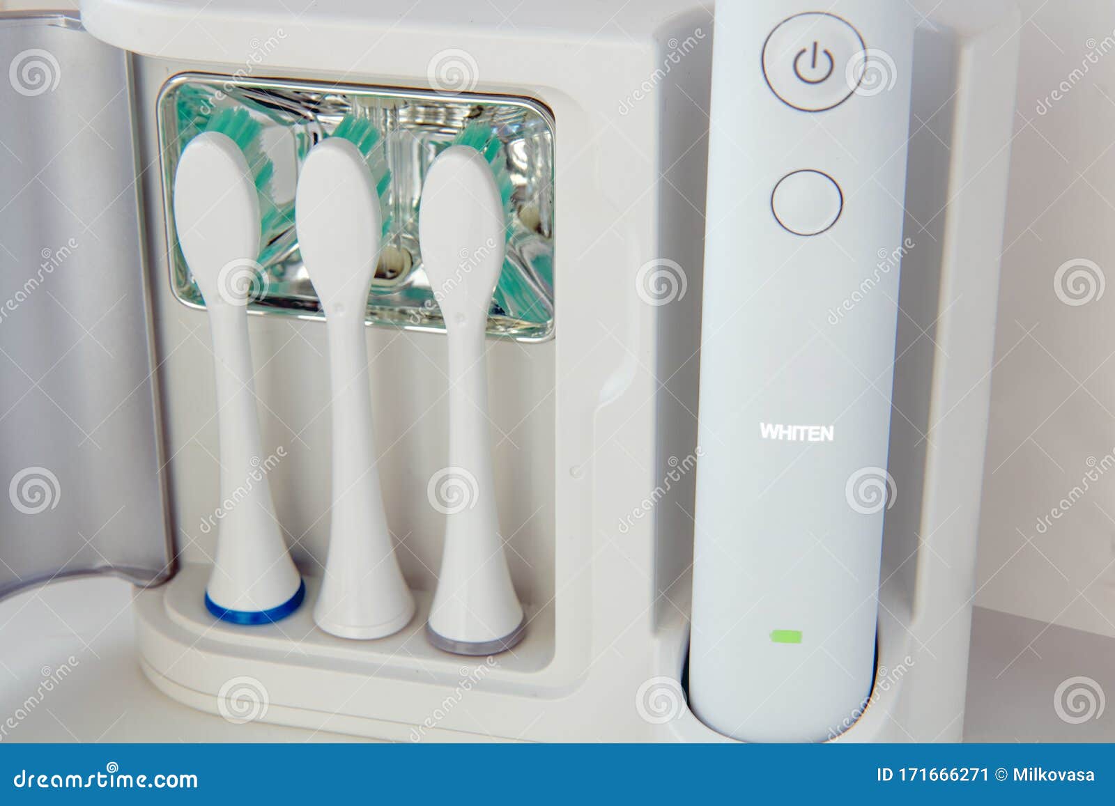 An Electric Toothbrush with Replaceable Attachments of Tooth Brush with