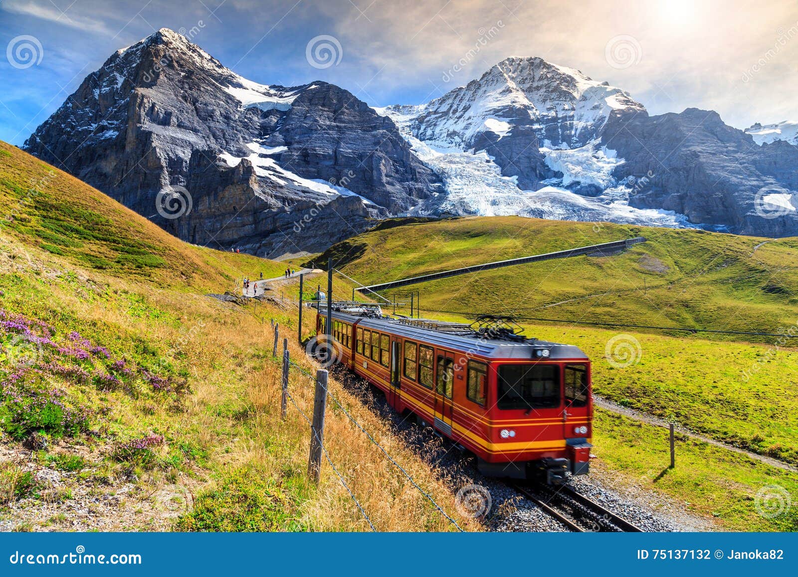 electric tourist train and eiger north face,bernese oberland,switzerland