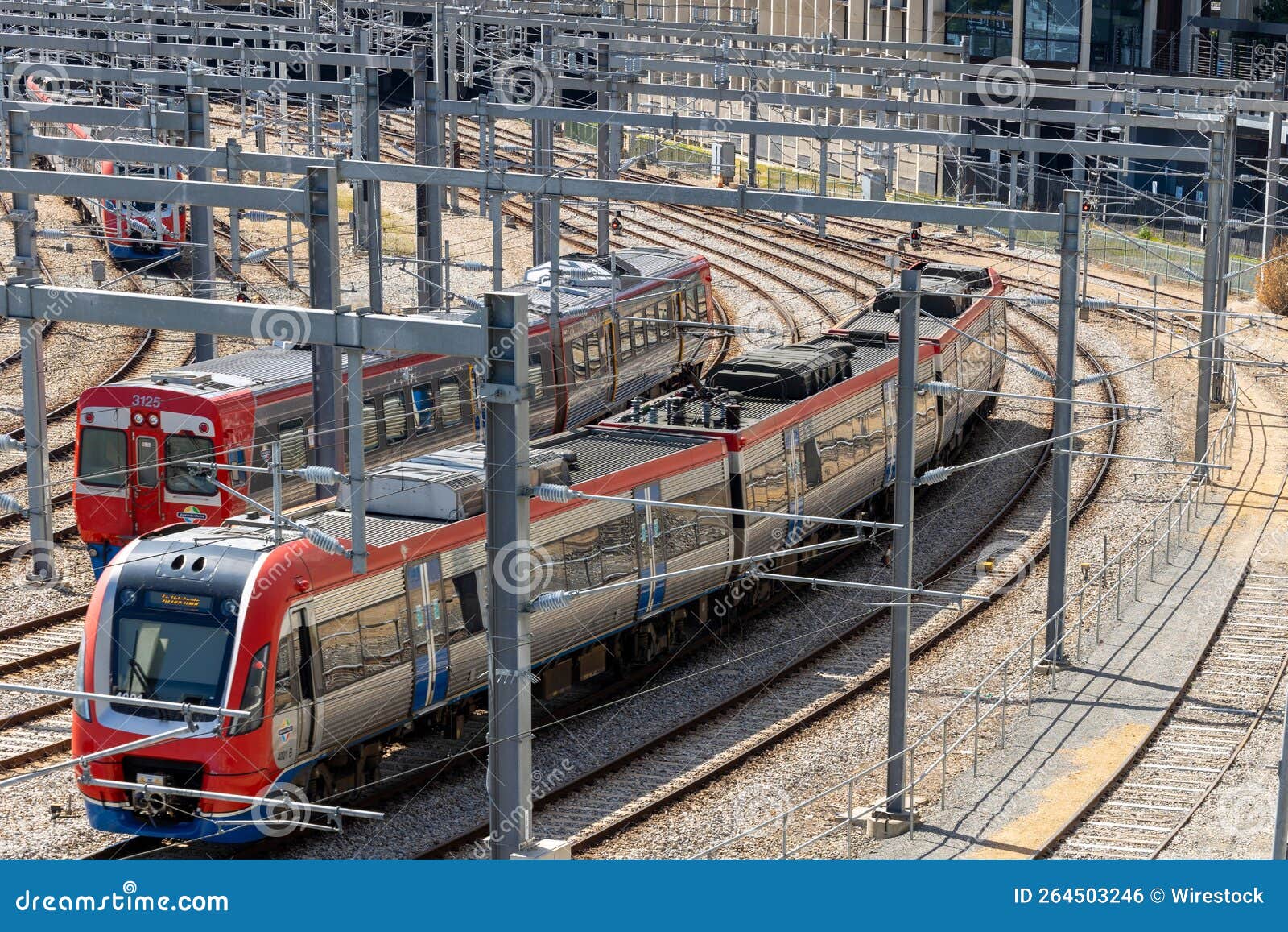 Electric Trains Passing Each Other at the Adelaide Rail Yard Editorial