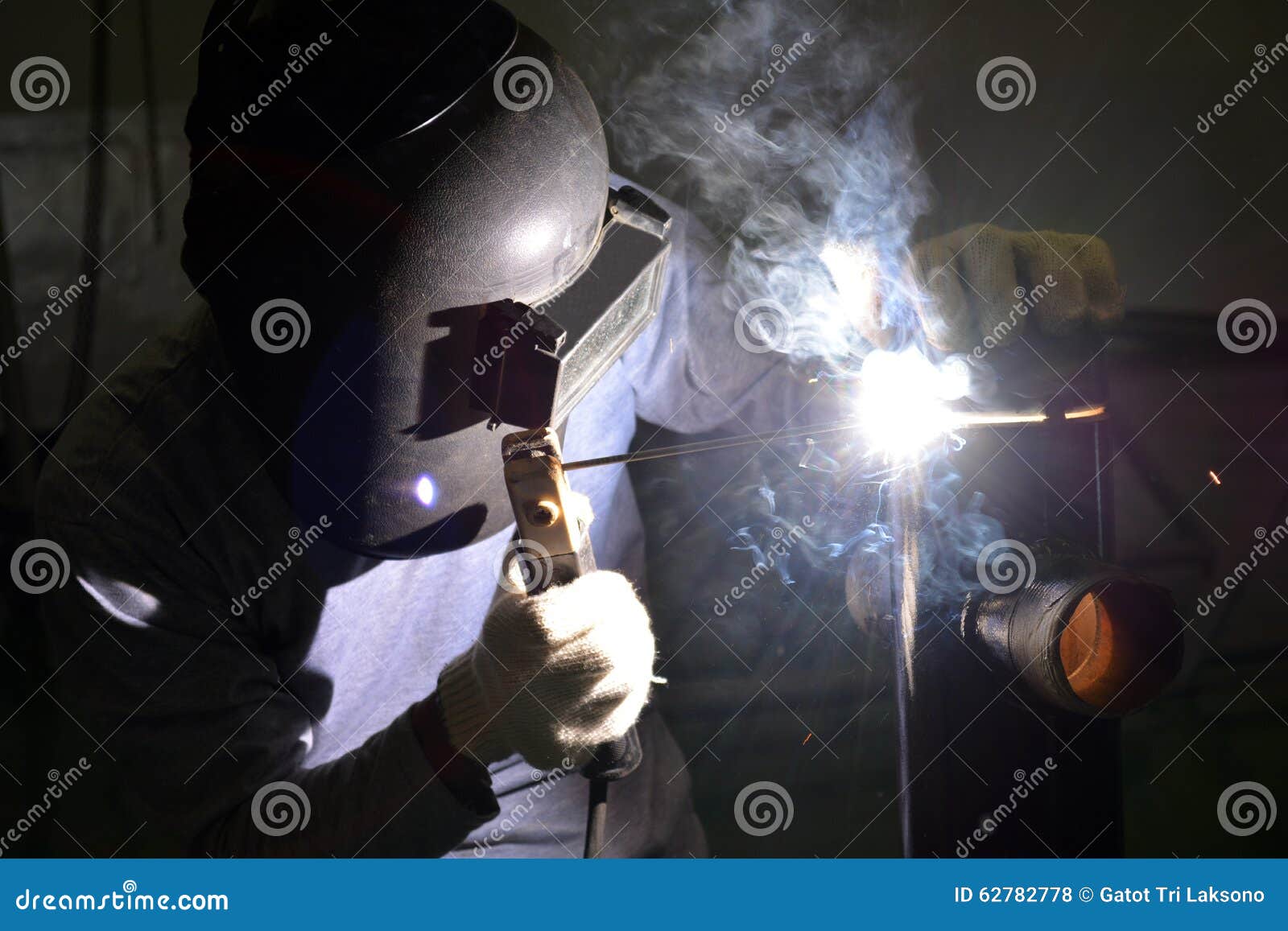 Electric Welding Of Iron Square Pipes For Construction Of Roof Grill