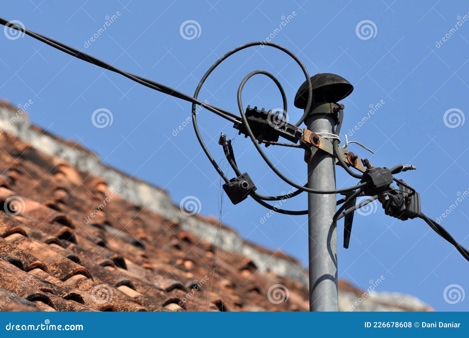 Electrical Cable Poles on the Roof of the House Stock Photo Image of