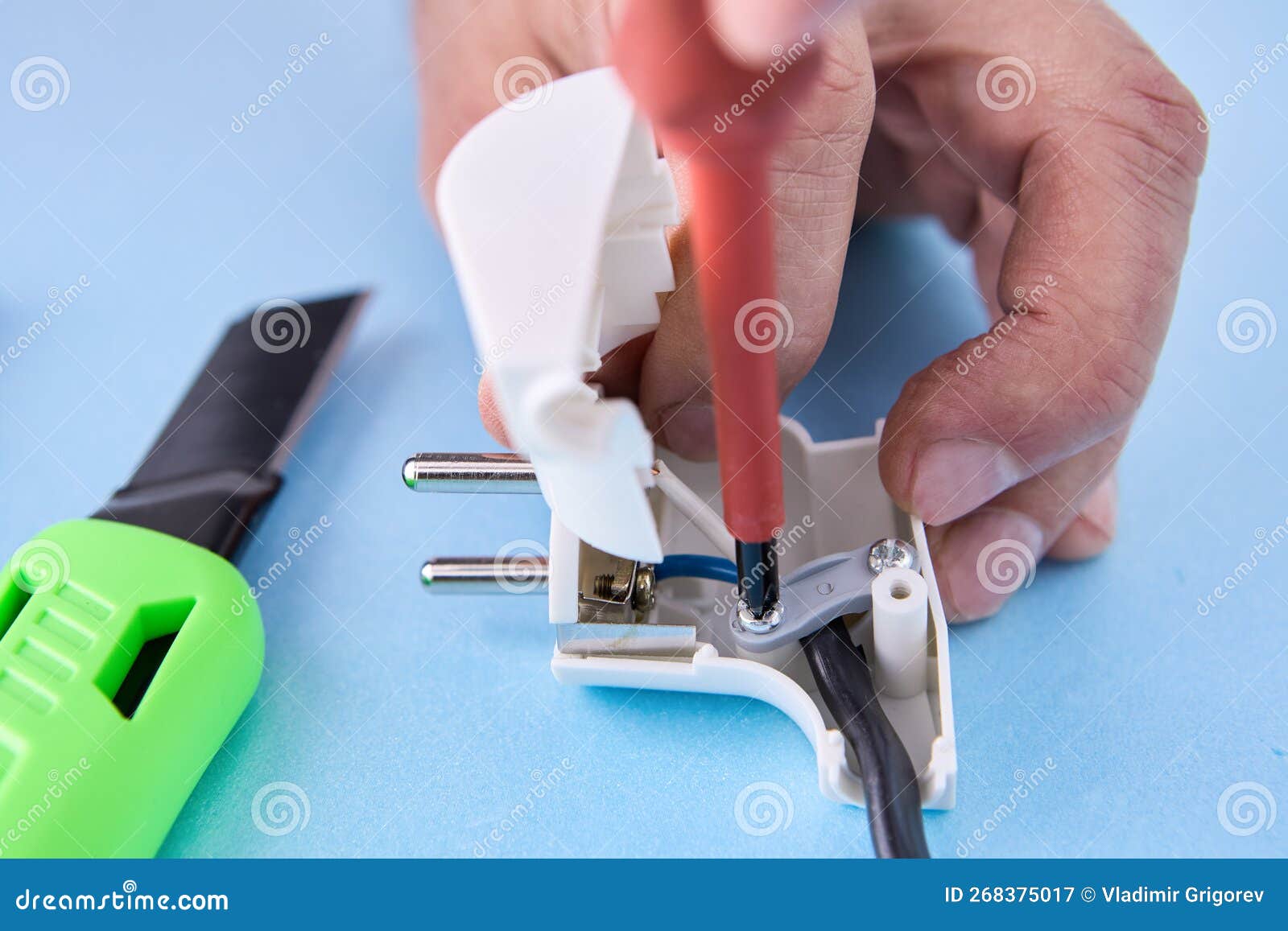 Electrical Cord is Connected To Folding Electric Plug and Secured with
