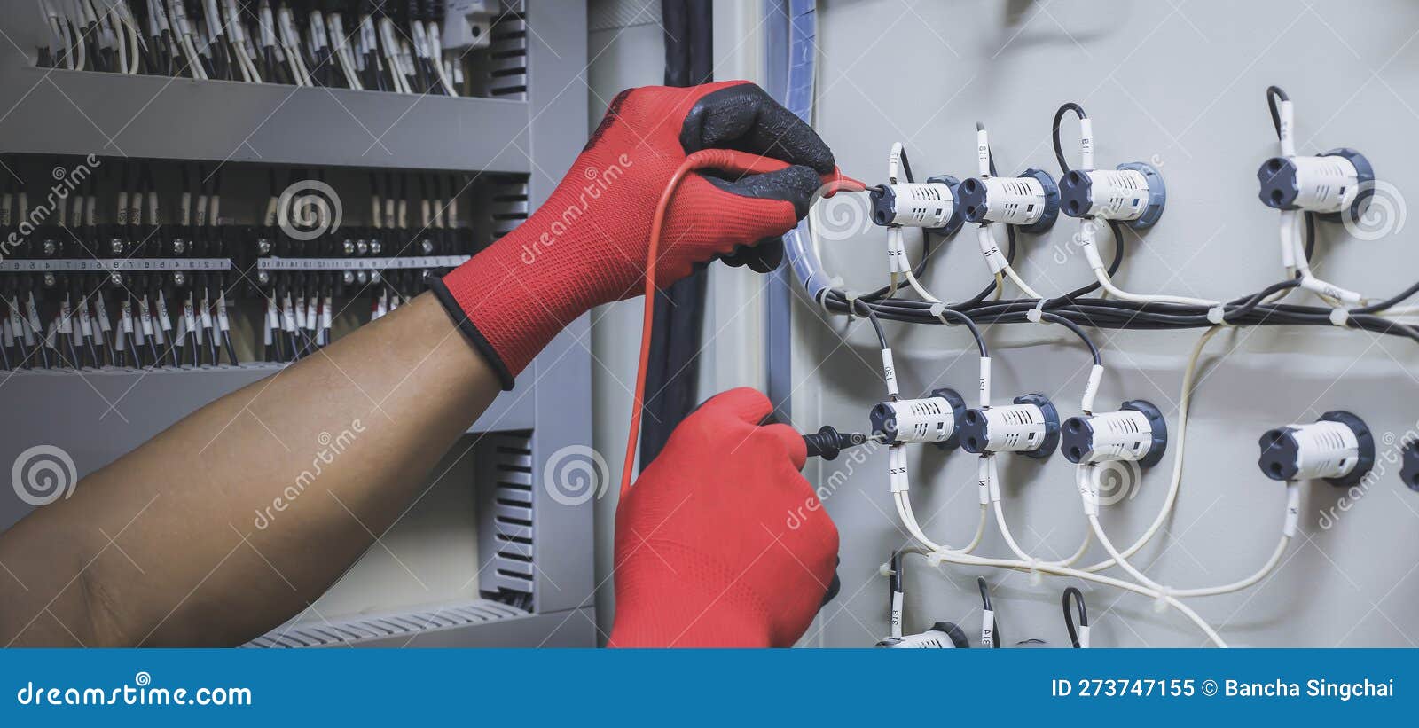 Electrical Engineer Tests the Operation of the Electric Control on a Regular Basis for