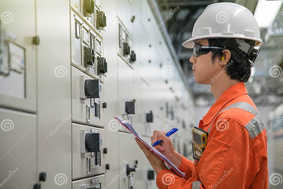Electrical and Instrument Technician Checking Electrical Control
