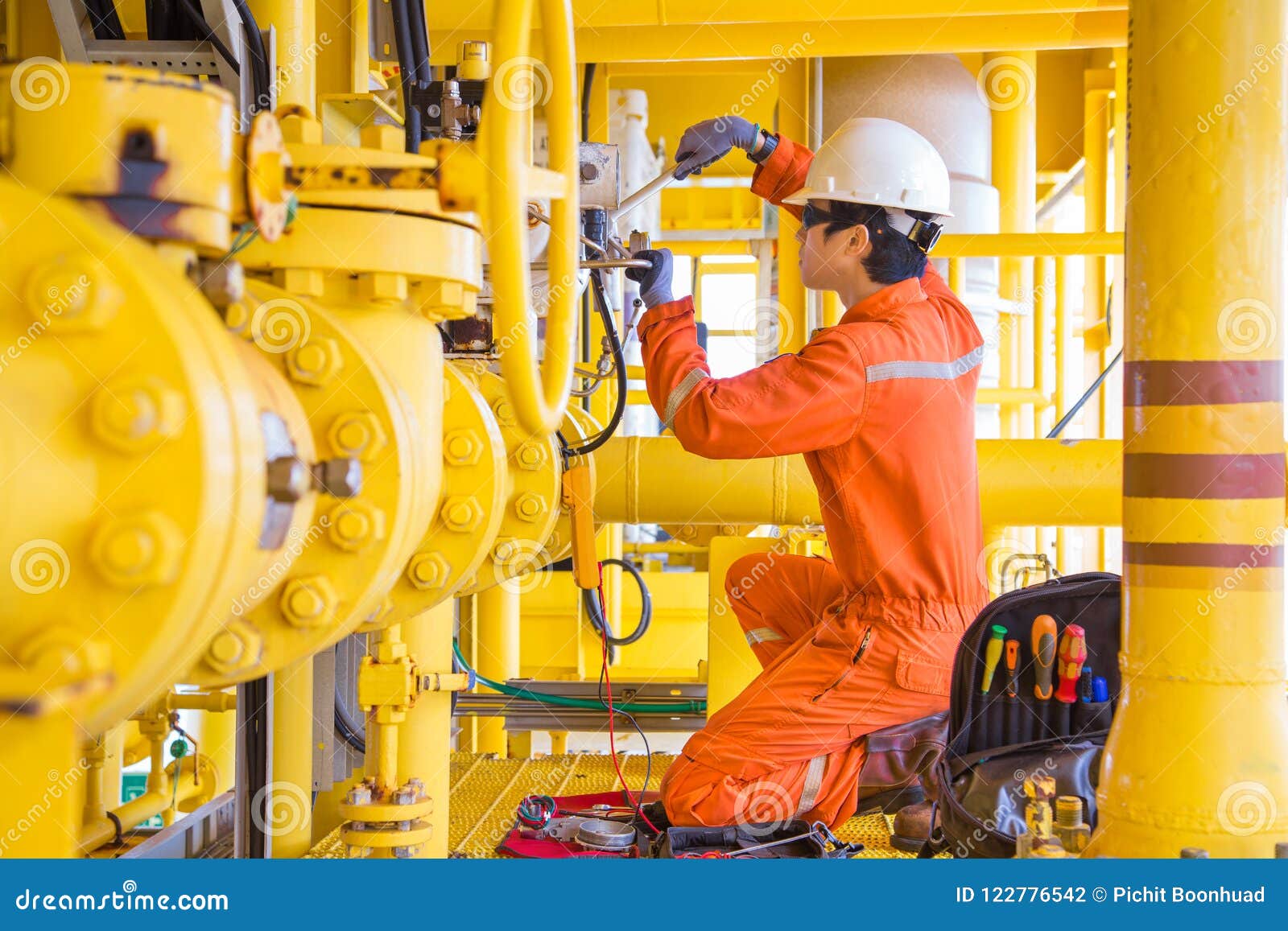 electrical-and-instrument-technician-fixing-and-replacing-solenoid