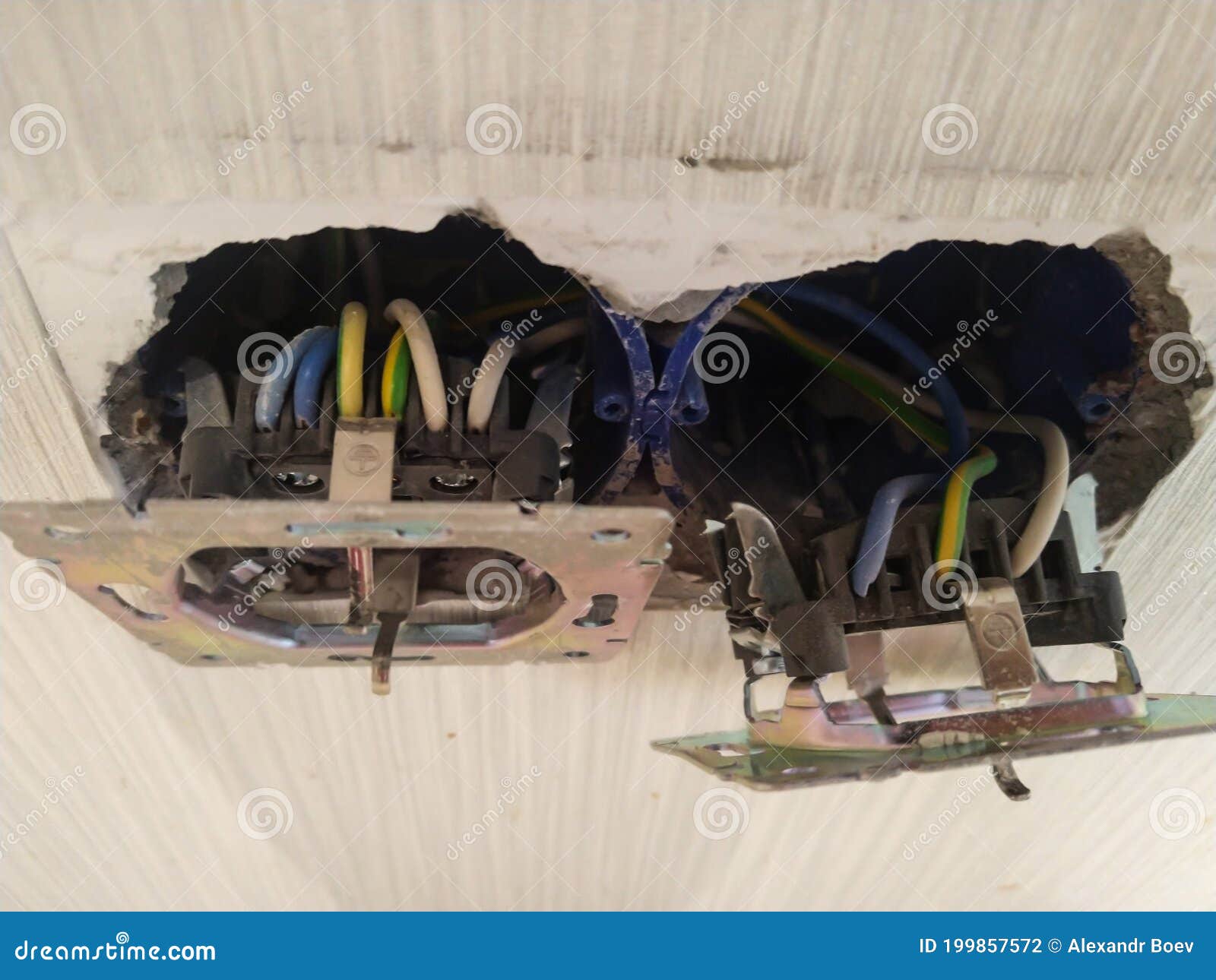 An Electrical Outlet for Electrical Appliances is Removed from the Wall