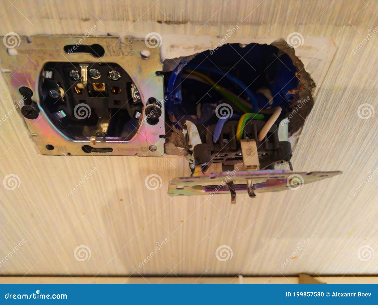 An Electrical Outlet for Electrical Appliances is Removed from the Wall