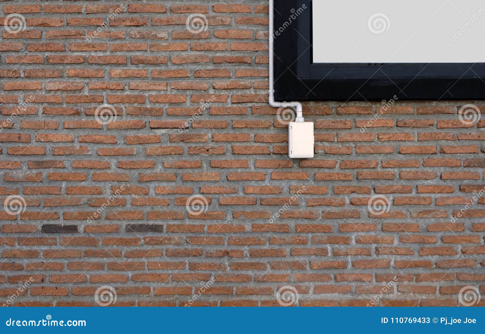 Power Outlets on the Brick Wall Vertical Orientation. Stock Image