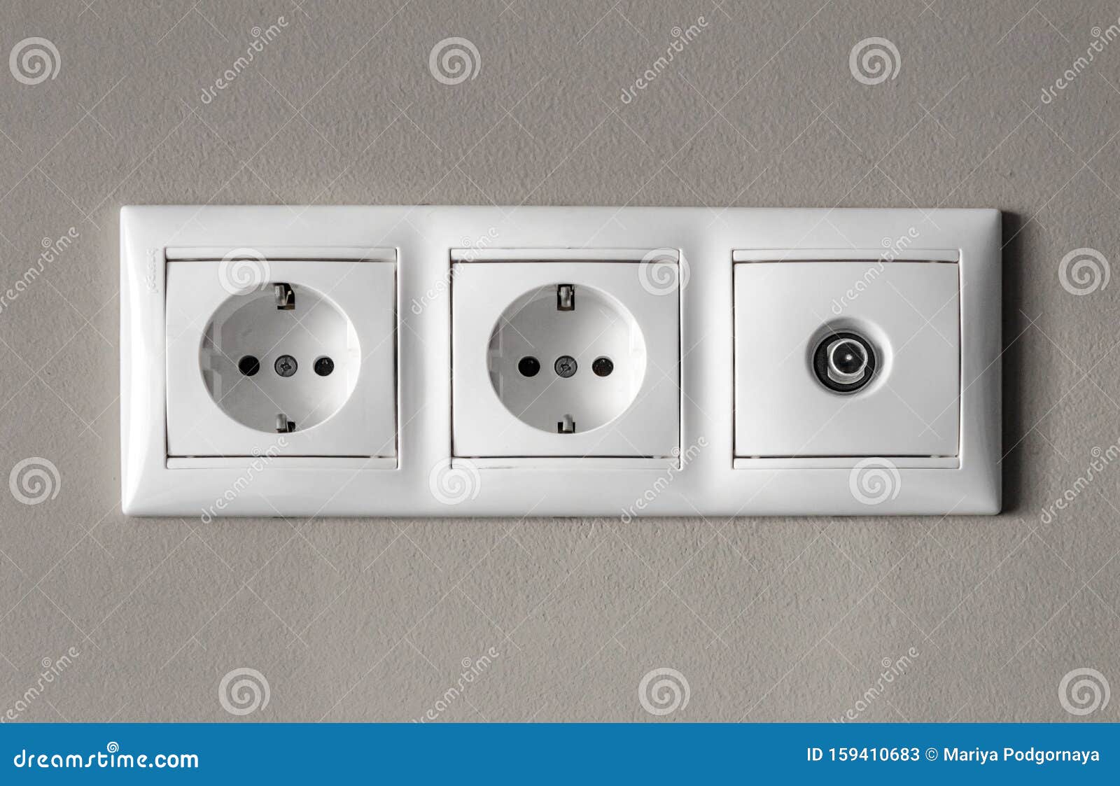 Electrical Outlets, a Set of Three White Empty Electrical Sockets for