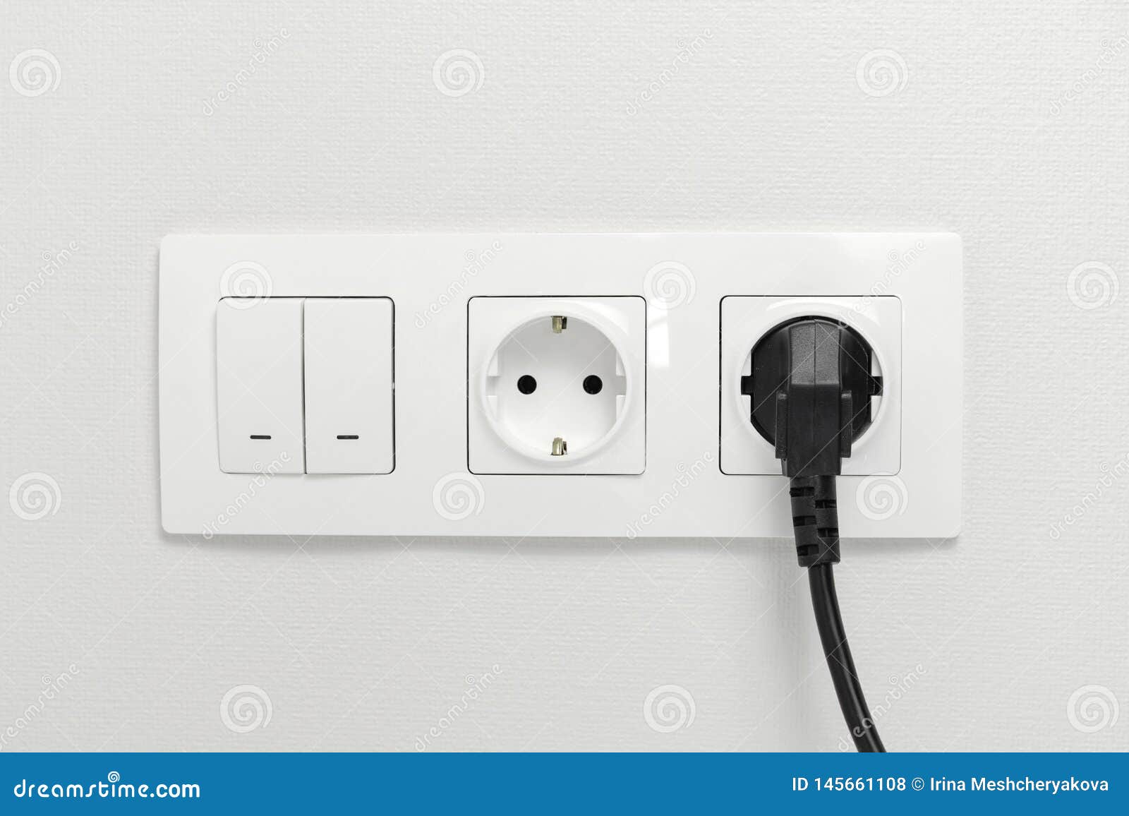 Electrical Sockets On The Wall With Black Connection Plug And White Switch Stock Photo Image