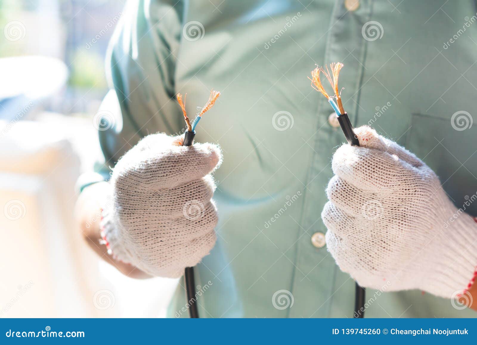 The Electrical Technician is Holding the Power Cord for Installation Stock Photo Image of