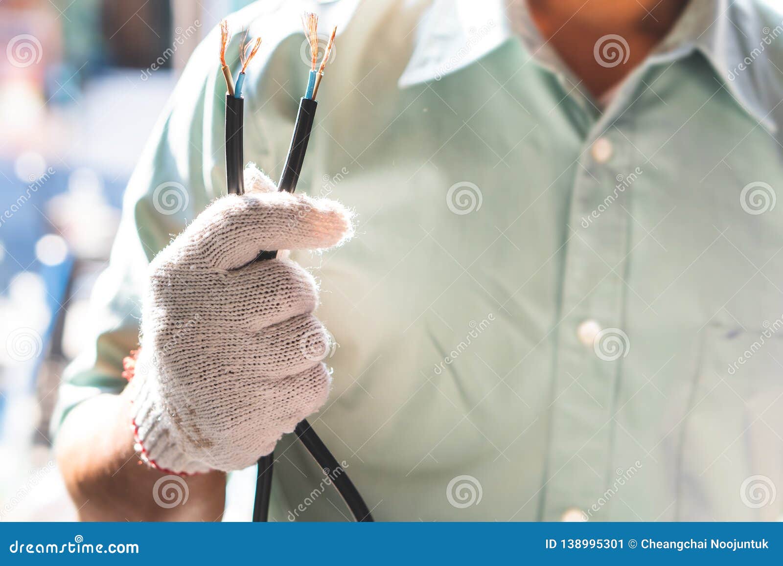 The Electrical Technician is Holding the Power Cord for Installation Stock Image Image of