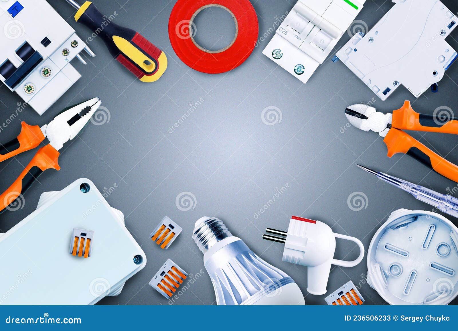 Electrical Tools and Equipment on Grey Background with Copy Space