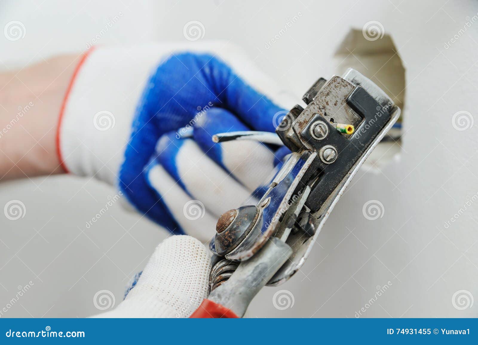 Electrican Stripping Insulation from Wire. Stock Image Image of wire