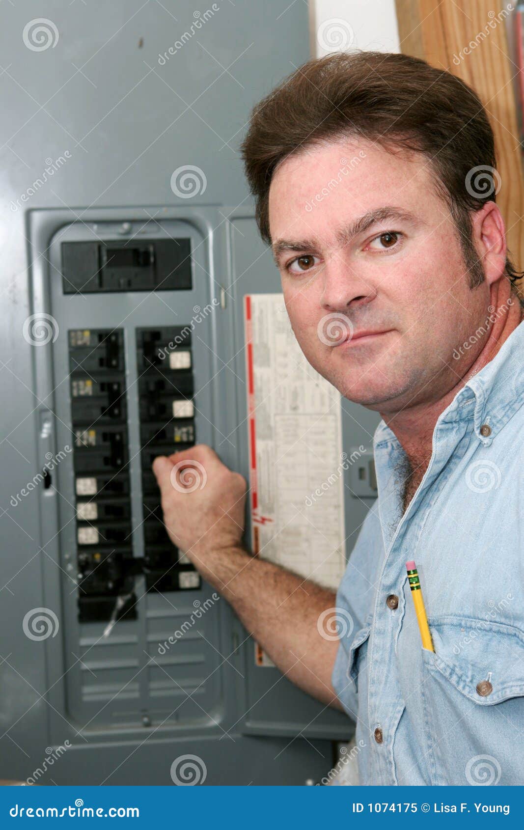 electrician at breaker panel
