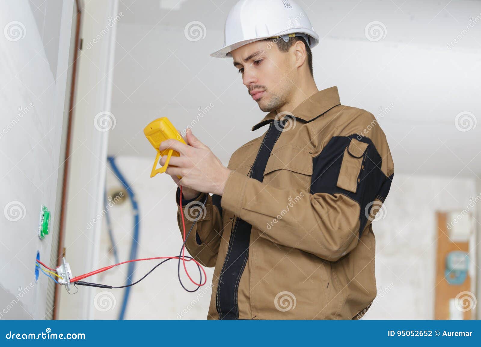 Electrician Checking Socket Voltage Using Multimeter in Wall Fixture Stock Photo Image of