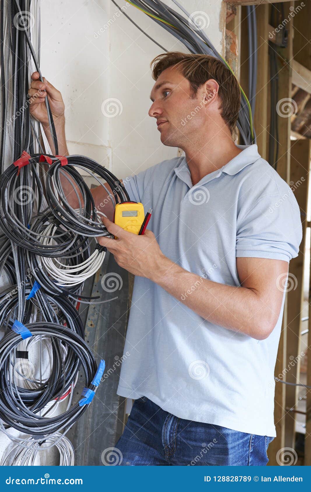 Electrician Fitting Wiring On 